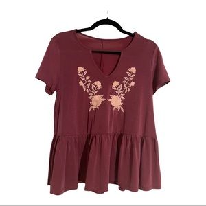 Medium peplum embroidered top